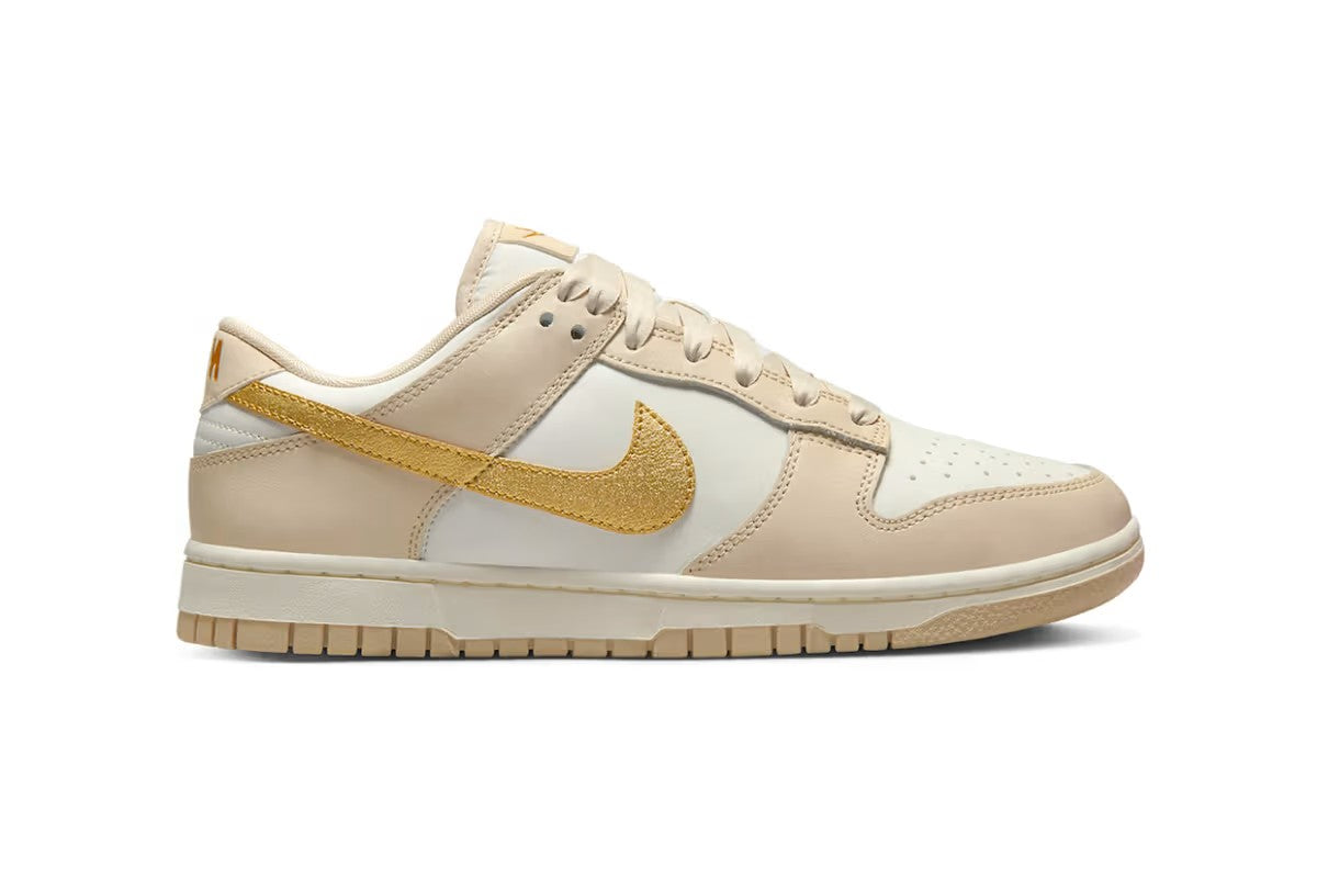 Nike Dunk Low Surfaces With Golden Swooshes