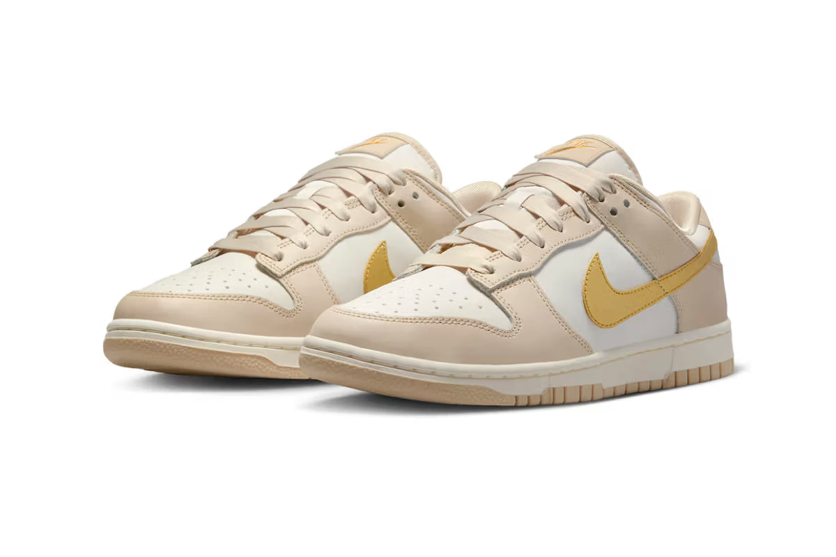 Nike Dunk Low Surfaces With Golden Swooshes