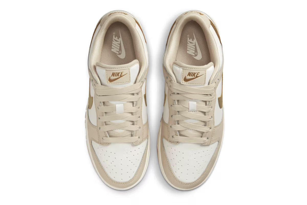 Nike Dunk Low Surfaces With Golden Swooshes